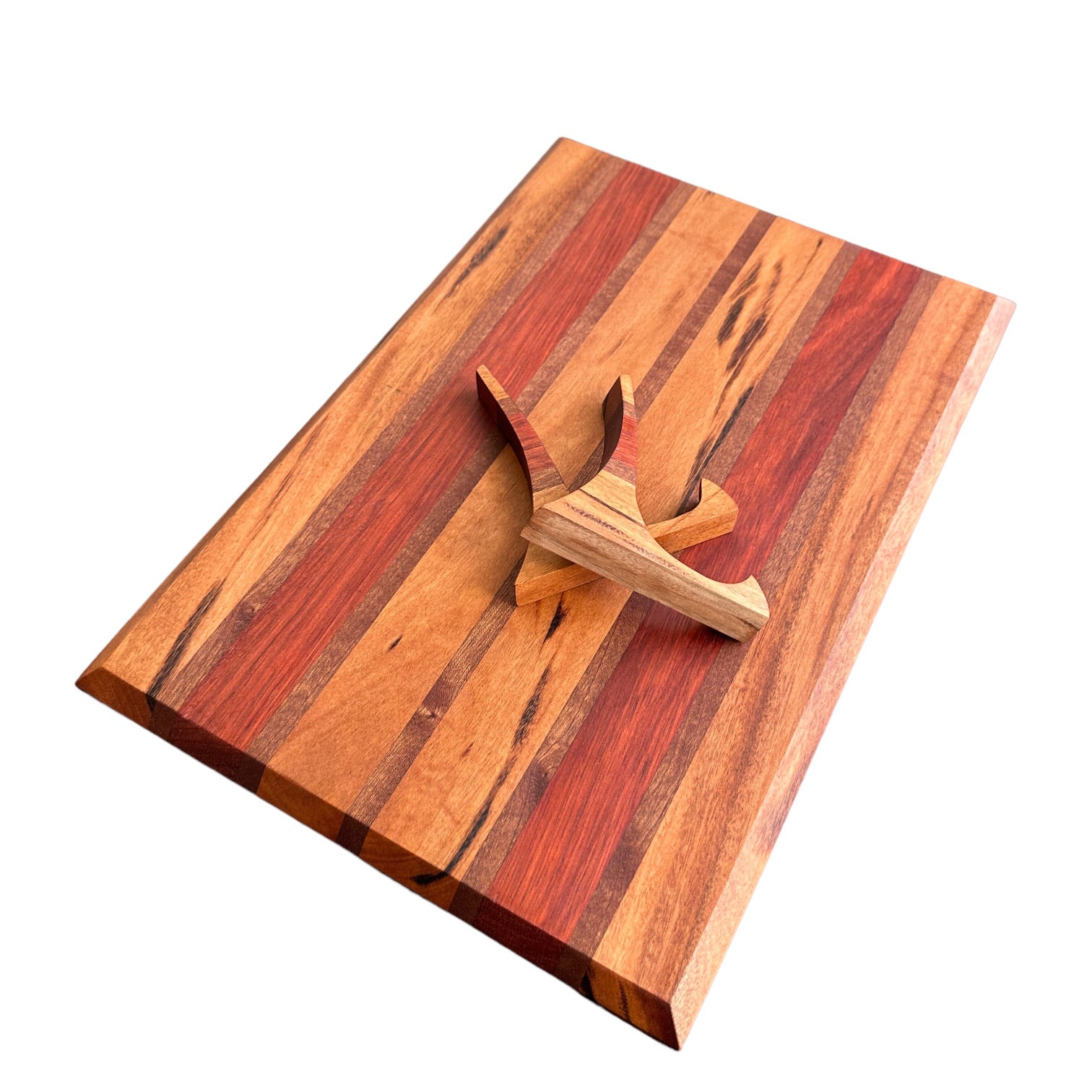 https://cornerstonewoodcraft.com/cdn/shop/products/exotic-tigerwood-handmade-wooden-cutting-board-rts-138850.jpg?v=1692233412&width=1946